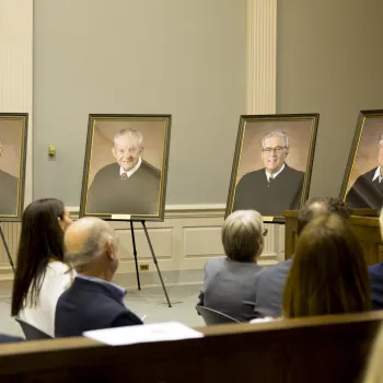 Portraits of retired Magistrate Judges Arthur H. Latimer, F. Owen Eagan, Thomas P. Smith, and Holly B. Fitzsimmons are unveiled at the Richard C. Lee Courthouse in New Haven.