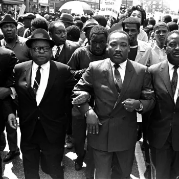 Martin Luther King, Jr., leads a sanitation workers' protest that dissolved into vandalism.