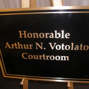 The courtroom Votolato has presided in since 1982 was dedicated in his honor with a plaque unveiled during the ceremony.