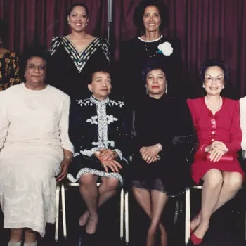 Constance Baker Motley, the first African American woman to serve as a federal judge, poses with a  group of colleagues. 