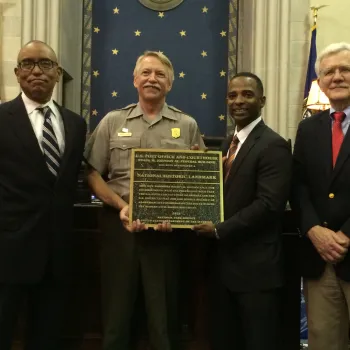 National Park Service presents plaque to Frank M. Johnson Jr. Federal Building and U.S. Courthouse in Montgomery, Alabama on July 20, 2015.