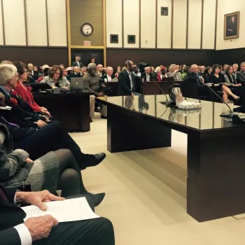 Members of the Oklahoma City legal community listen to a recent ceremony dedicating the Learning Center.  