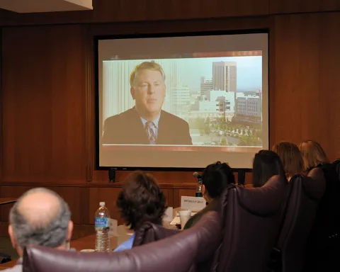 Image of people watching a webcast