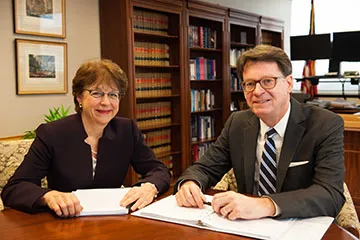 Deputy Director Jill Sayenga and Director James C. Duff 