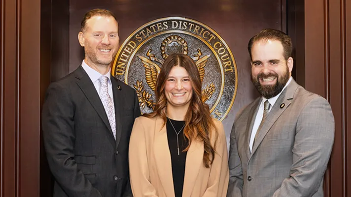 Photo of three employees of the Northern District of New York.