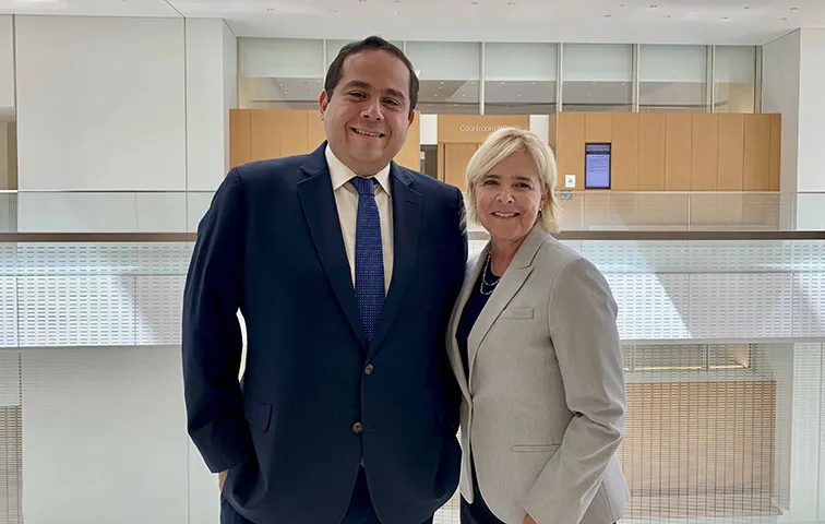 Cuauhtemoc Ortega and his mentor Amy Karlin inside the federal courthouse in Los Angeles.