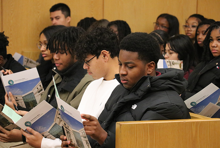 Students prepare for an interactive courtroom simulation exercise during a Bill of Rights Day civics education event at the federal courthouse in Washington, D.C.