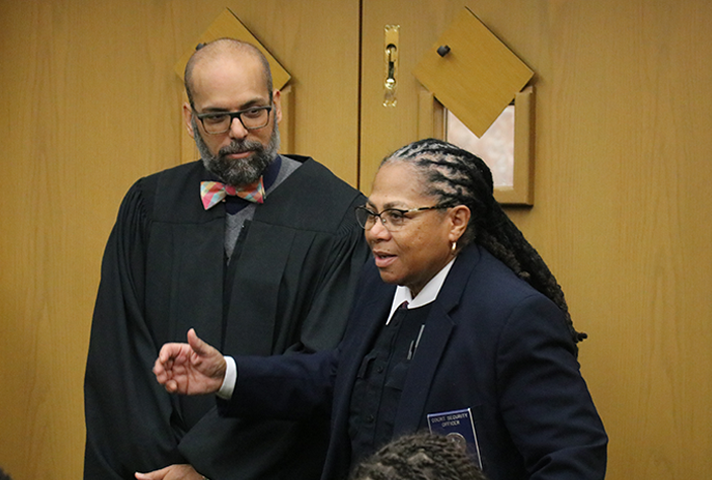 A court security officer speaks to students about her path to a career in the federal courts.